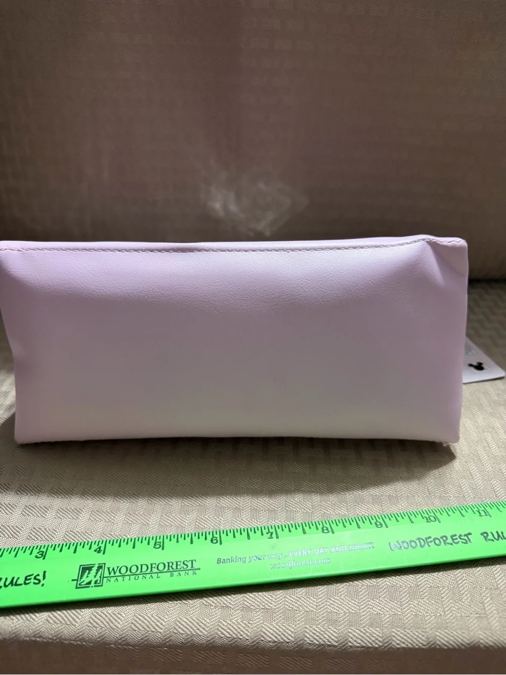 Minnie Mouse Pink Clear Cosmetic Bag “L” monogram on front.